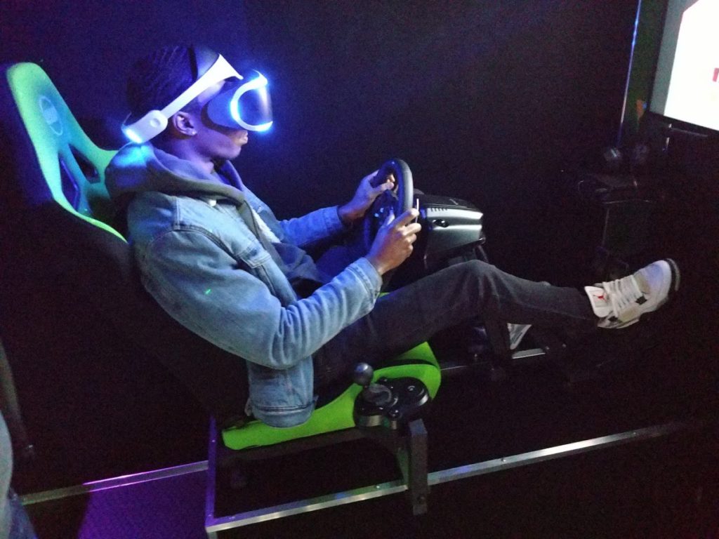 Virtual Reality racing simulator at Middle Georgia video game birthday party